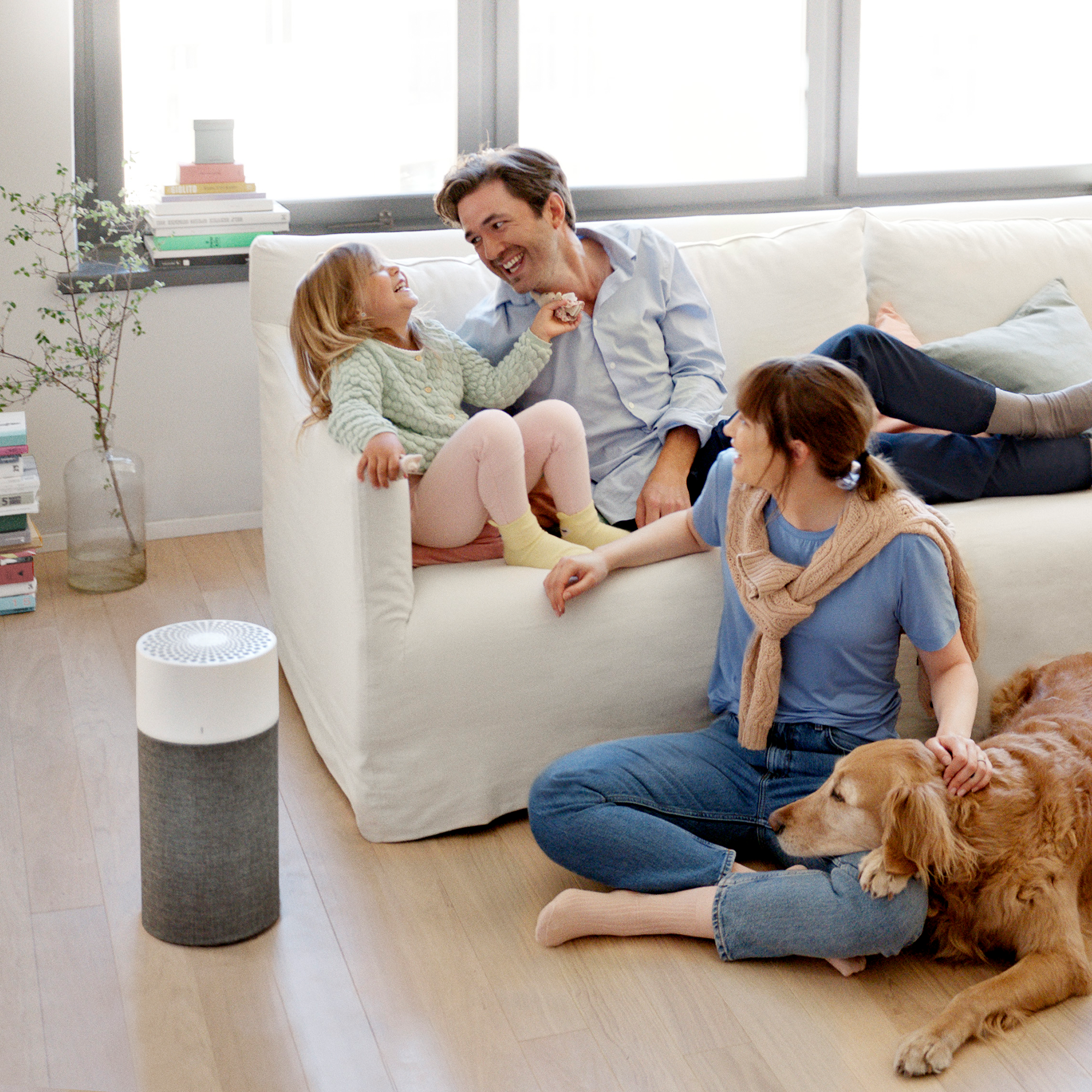 Blueair Blue Pure 411 auto air purifier in room with family
